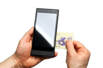 Male hands holding wireless pos terminal and banking card