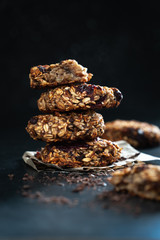 healthy dessert, fitness food, oatmeal cookies with banana on a dark table