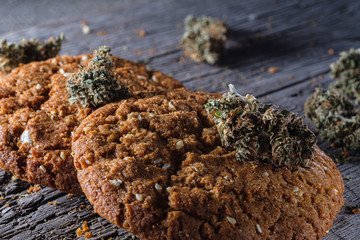 biscuits with hemp on an old wooden background close-up. rustic. Horizontal orientation.