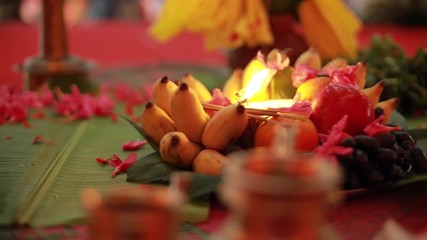 Traditional south Indian brass oil lamp 'Nilavilakku '. During events like housewarming, marriage etc., the Nilavilakku is lighted before starting the rituals. This video is taken during a wedding