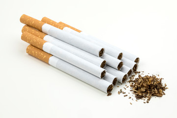 Close up of a smoking cigarettes on white