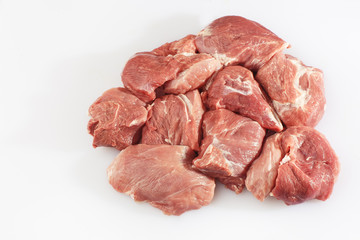 Slices pork loin on a white background. Raw pork . Advertising for meat shop and farm. Various kinds of meat and ready to cook concept. Top view. Space for text