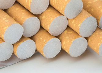 Macro shoot of cigarette filters. Heap of Tobacco Cigarettes.