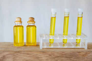 CBD oil hemp products, Medicinal cannabis with extract oil in a bottle on a wooden table. Medical cannabis concept