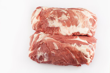 slices loin on a white background. Raw pork . Advertising for meat shop and farm. Various kinds of meat and ready to cook concept. Top view. Space for text