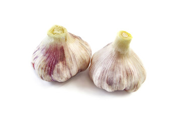 Obraz premium Garlic bulbs on a white background