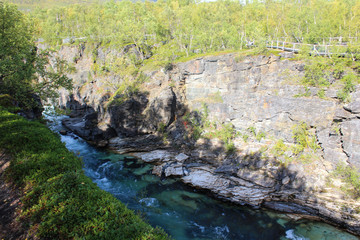 Large river in the arctic tundra. Abisko national park, Nothern Sweden