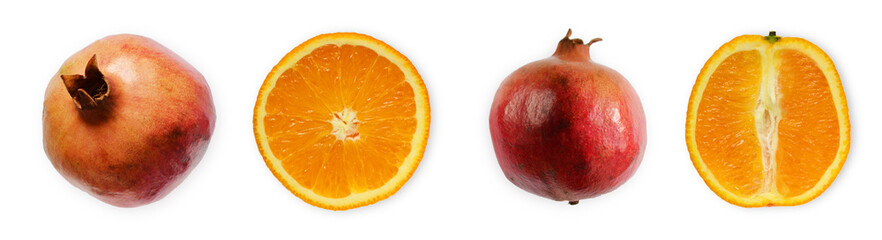 Juicy halves of orange and pomegranates on a white background.