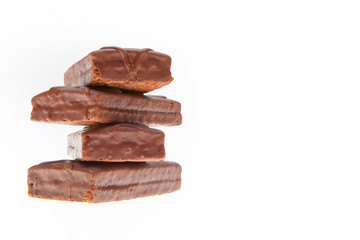 A stack of chocolate biscuits isolated on a white background