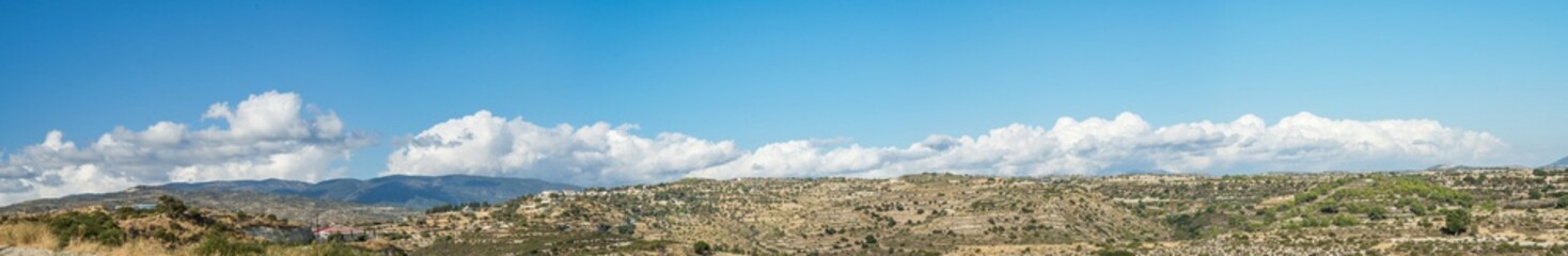 Fototapeta na wymiar Panoramic mountain landscape on a sunny day, Cyprus.