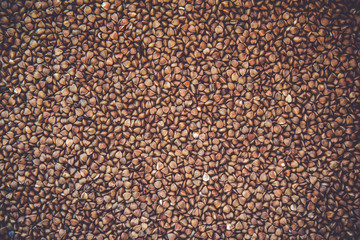 Top view of uncooked buckwheat. Background