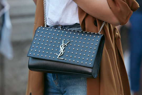 Woman With Black Leather With Studs Yves Saint Laurent Bag On September 21, 2017 In Milan, Italy