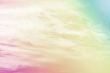 A soft cloud with a pastel colored orange to blue gradient for background
