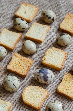 Pattern of instant quail eggs and croutons.