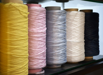 Polypropylene multifilament yarns with selective focus. Large colorful polypropylene threads set. Pastel bobbin thread.