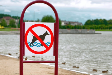Dogs prohibited, no dogs allowed signal at beach coast. Sign that prohibited dogs from entering the...