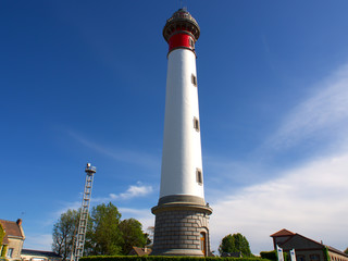 Lighthouse on a background of blue sky, Ouistreham, France