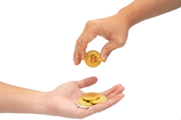 Isolated White Background with Clipping Path of Asian Hand Giving Gold Bitcoin Cryptocurrency to other Hand. Symbol for Block Chain Virtual Online Transaction on Internet Business in Modern World