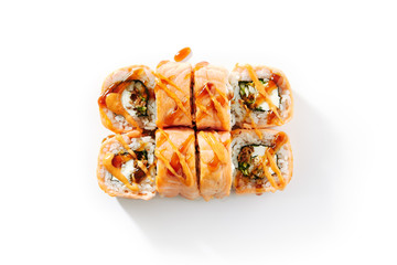 Salmon rolls on white background top view