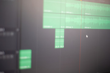 Audio edit in the recording studio, a close-up screen. Music editing in a computer application, sound control and correction, professional editing at work