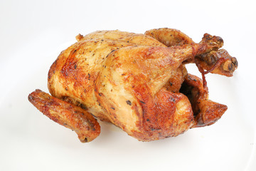 Whole roasted grilled chicken poultry bird on white background