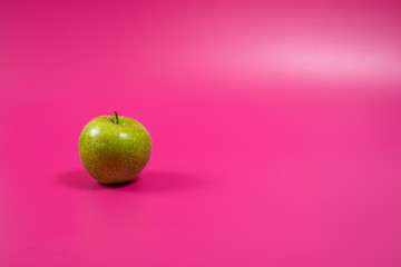 sour green apple on background