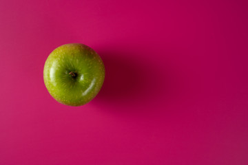 sour green apple on background