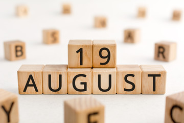 August 19 - from wooden blocks with letters, important date concept, white background random...