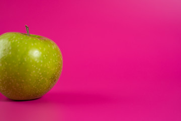 sour green apple on background