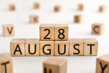 August 28 - from wooden blocks with letters, important date concept, white background random...