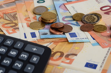 Calculator and euro cash bank notes