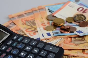 Calculator and euro cash bank notes