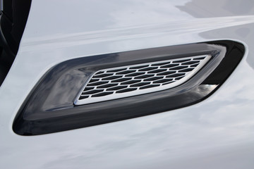 Close up of a vehicle hood vent