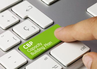 CBP Capacity Building Plan - Inscription on Green Keyboard Key.
