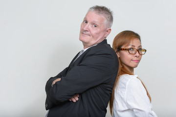 Mature multi ethnic business couple working together