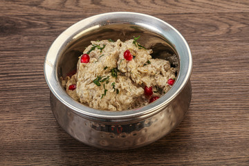 Vagan dietary cusine - mutabal with granet seeds