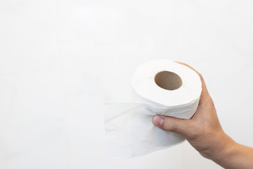 Tissue, Close up of a man hand using detail of one single clean toilet paper roll on white background,  Hygiene  Health care concept.