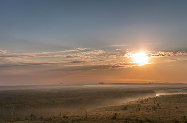 sunrise and river in the fog