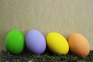 Many colored eggs on the grass