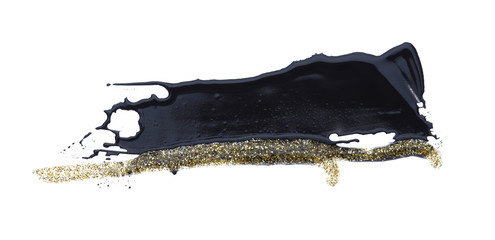 Abstract acrylic black and gold color smear brush stroke. Isolated on white background.
