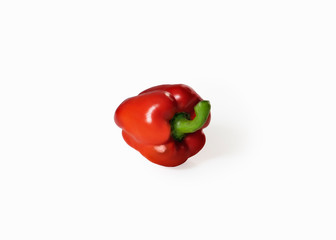 Red bell pepper lies on a white background. Bright color. One object isolated on white background.