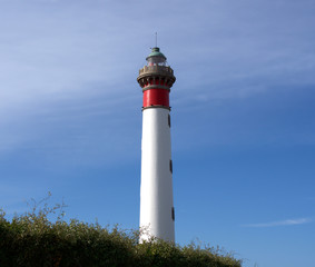 Lighthouse on a background of blue sky, Ouistreham, France