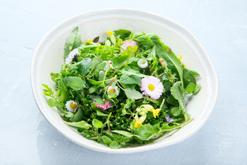 Mixed salad leaves with edible flowers