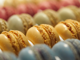 French delicious dessert macaroons close up pattern assorted