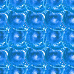 The seamless abstract pattern with blue hand drawn watercolor circles