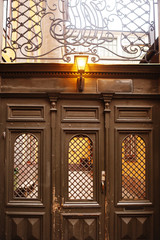 Wooden doors to the courtyard.