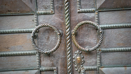 The fragment of forged metal products. close-up. Details, structure and ornaments of wrought iron...