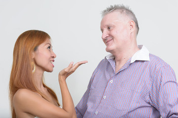 Happy mature multi ethnic couple together and in love