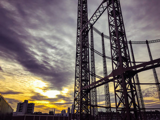 Stormy skies over london gasworks