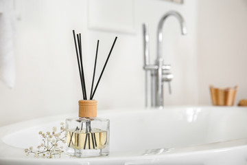 Reed diffuser in modern bathroom
